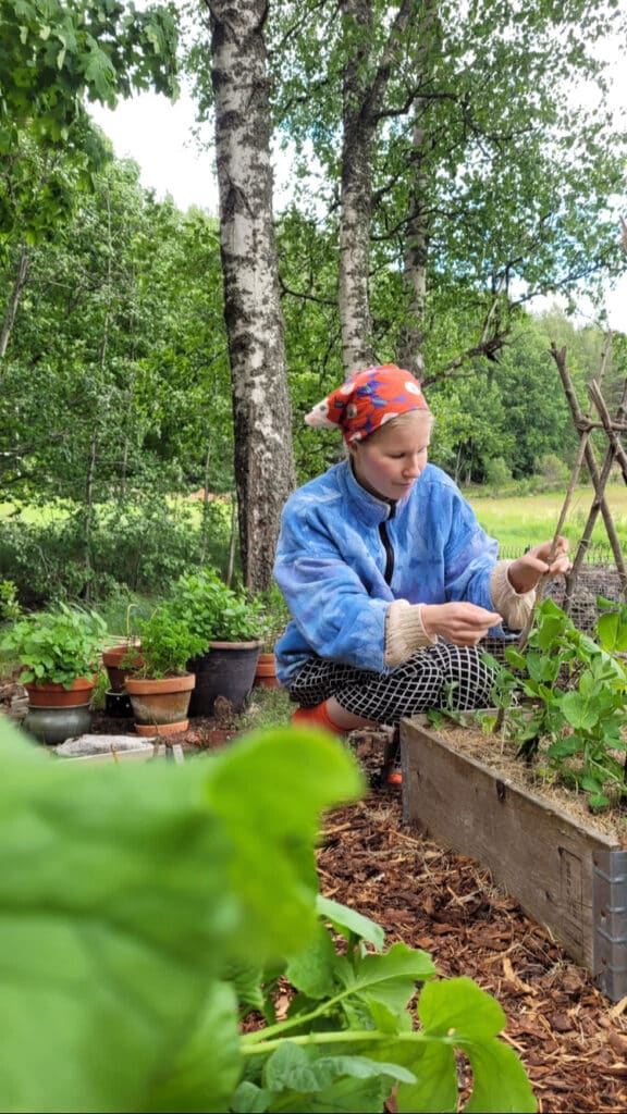 Anni Rastas doing gardening